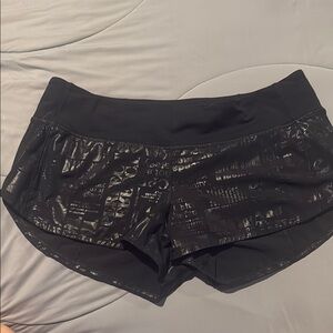 Lululemon Athletica Black Athletic Shorts with Sleek Design Size 8